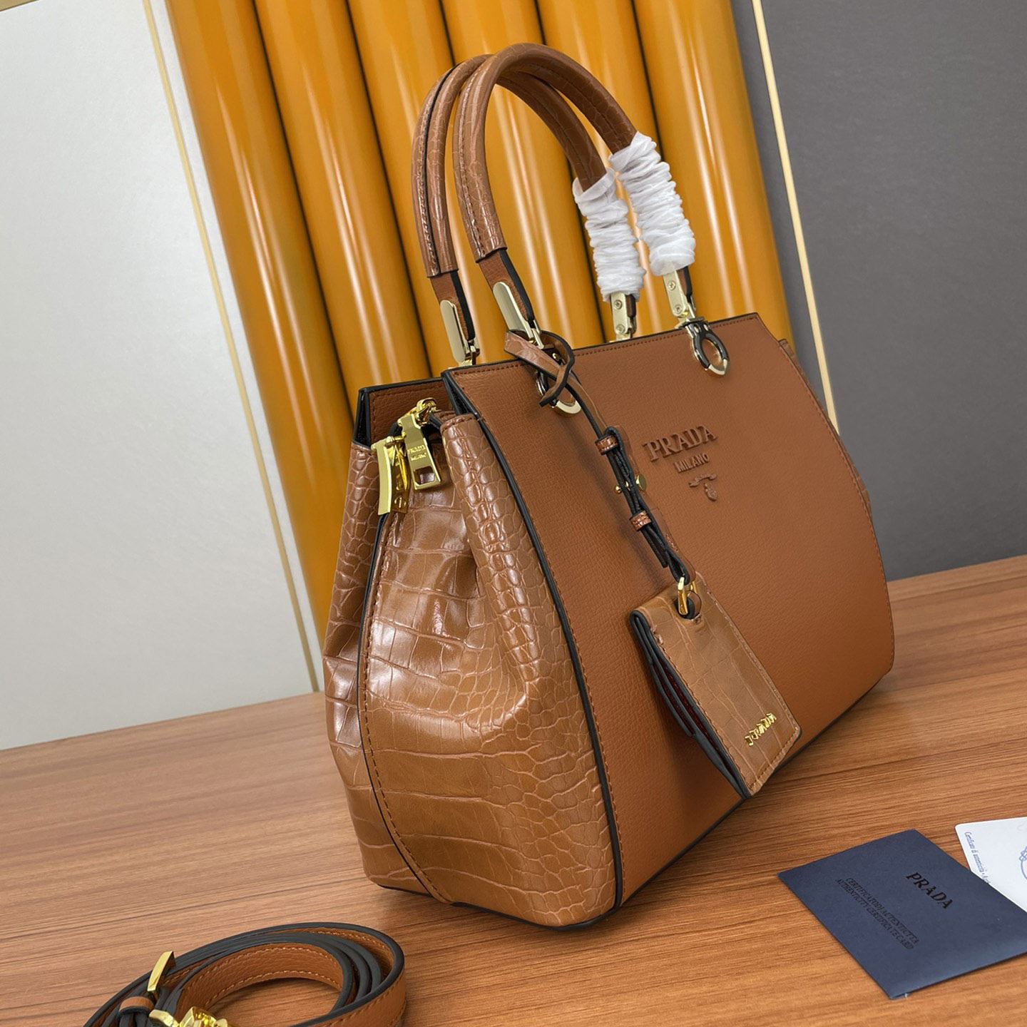 Pra*a top handle bags